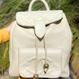 Vintage Chanel Double C Cream Lambskin Drawstring Flap Backpack