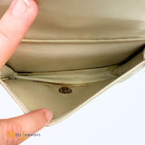 Vintage Chanel Double C Cream Lambskin Drawstring Flap Backpack