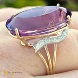 14K Two-Tone Yellow and White Gold Oval-Shaped 29ct Amethyst and 0.36ctw Diamond Cocktail Ring Size 8.25