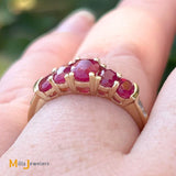 14K Yellow Gold 1.11ctw Ruby and 0.04ctw Diamond Band Ring Size 7