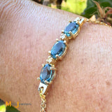 Vintage Atlantic Jewelry Co. 14K Yellow Gold 2.19ctw Blue Topaz and 0.02ctw Diamond Bracelet
