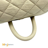 Vintage Chanel Double C Cream Lambskin Drawstring Flap Backpack