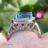 14K White Gold 4ct Cushion Cut Swiss Blue Topaz and 0.55ctw Diamond Halo Cocktail Ring Size 7