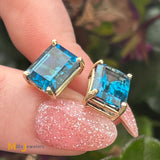 14K Yellow Gold 8.94ctw Emerald Cut Blue Topaz Stud Earrings