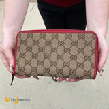 Gucci GG Beige Logo Long Canvas Leather Red Bifold Zip Around Wallet