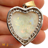 14K Two-tone Gold 20.37ct Australian Fire Opal and 1.08ctw Diamond Heart Pendant