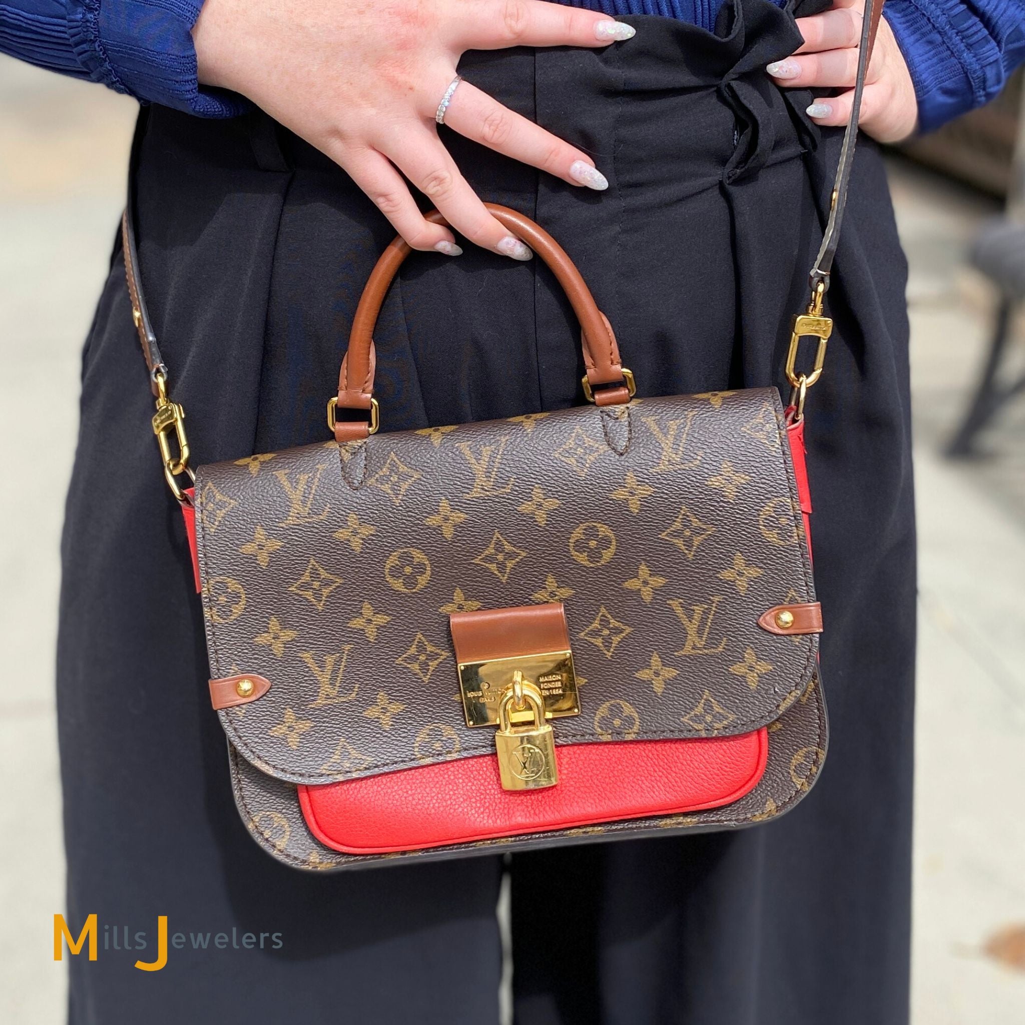 louis vuitton bag with red