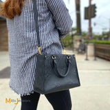 louis vuitton large monogram empreinte leather onthego shoulder bag