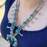 turquoise squash blossom necklace side view