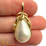Vintage World Wide Imports 14K Yellow Gold 0.03ctw Diamond and Mabe Pearl Pendant