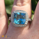 14K White Gold 4ct Cushion Cut Swiss Blue Topaz and 0.55ctw Diamond Halo Cocktail Ring Size 7