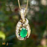 14K Yellow Gold 0.72ct Oval Emerald and 0.55ctw Diamond Slide Pendant