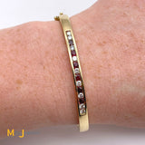 14k yellow gold diamond ruby bangle bracelet