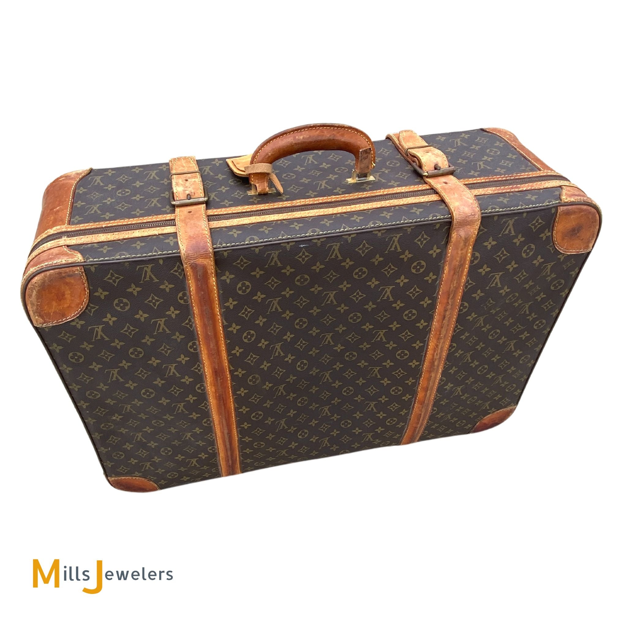 Lot 148 - A Louis Vuitton suitcase, with studded