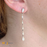 pear and kite shaped diamond dangle earrings platinum